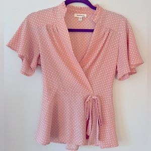 Pink polka dot peplum blouse
